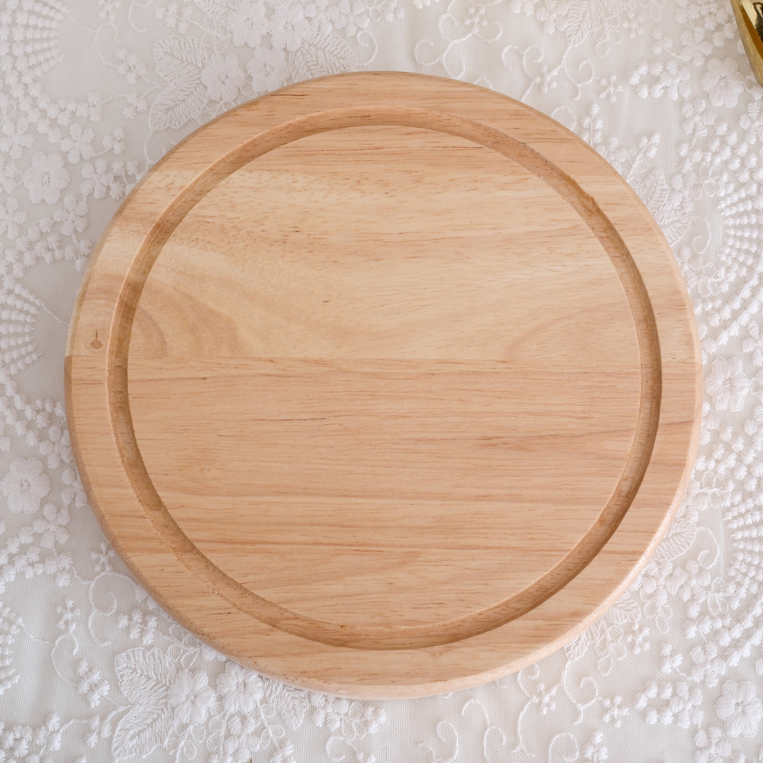 Mango wood appetizer serving board with hidden rotating storage drawer.