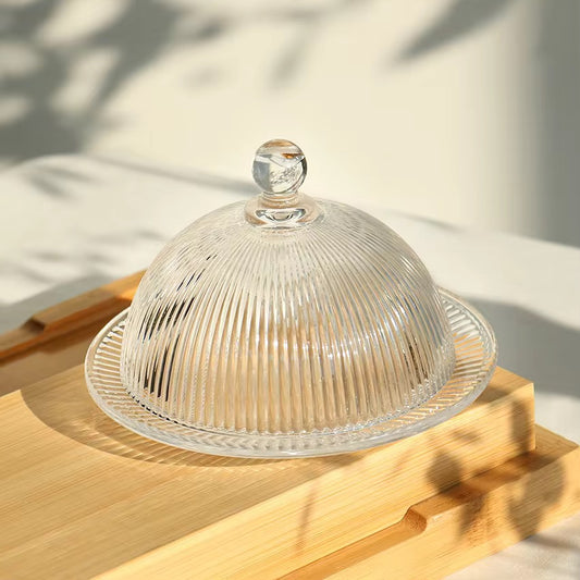 Elegant glass dessert plate with cloche dome for cakes and soufflés
