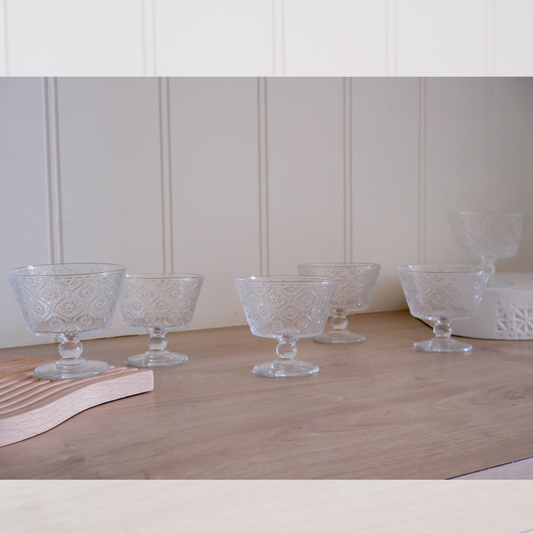 Thick glass ice cream cups featuring a decorative beaded pattern