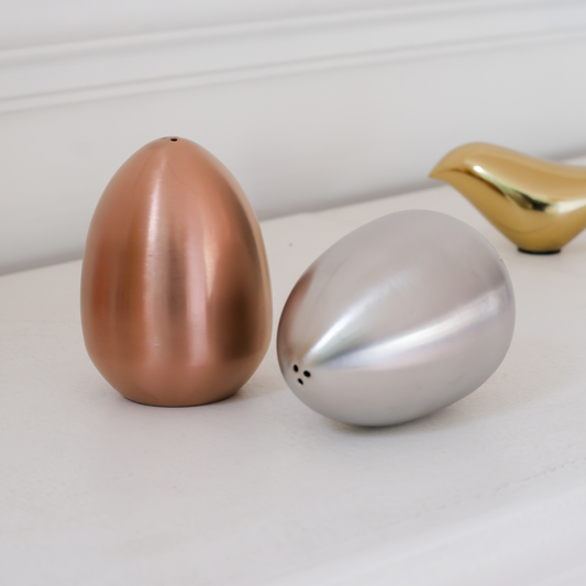 Stylish metallic condiment shaker set for luxury home entertaining.