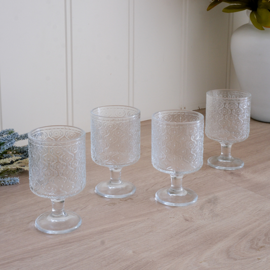 Retro-inspired textured drinking glasses with floral embossed detailing
