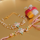 Floral Crystal Rakhi Set | Free with order value above Rs.3200