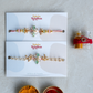 Floral Crystal Rakhi Set | Free with order value above Rs.3200