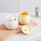 Designer porcelain ghee storage pot with matching spoon and lid