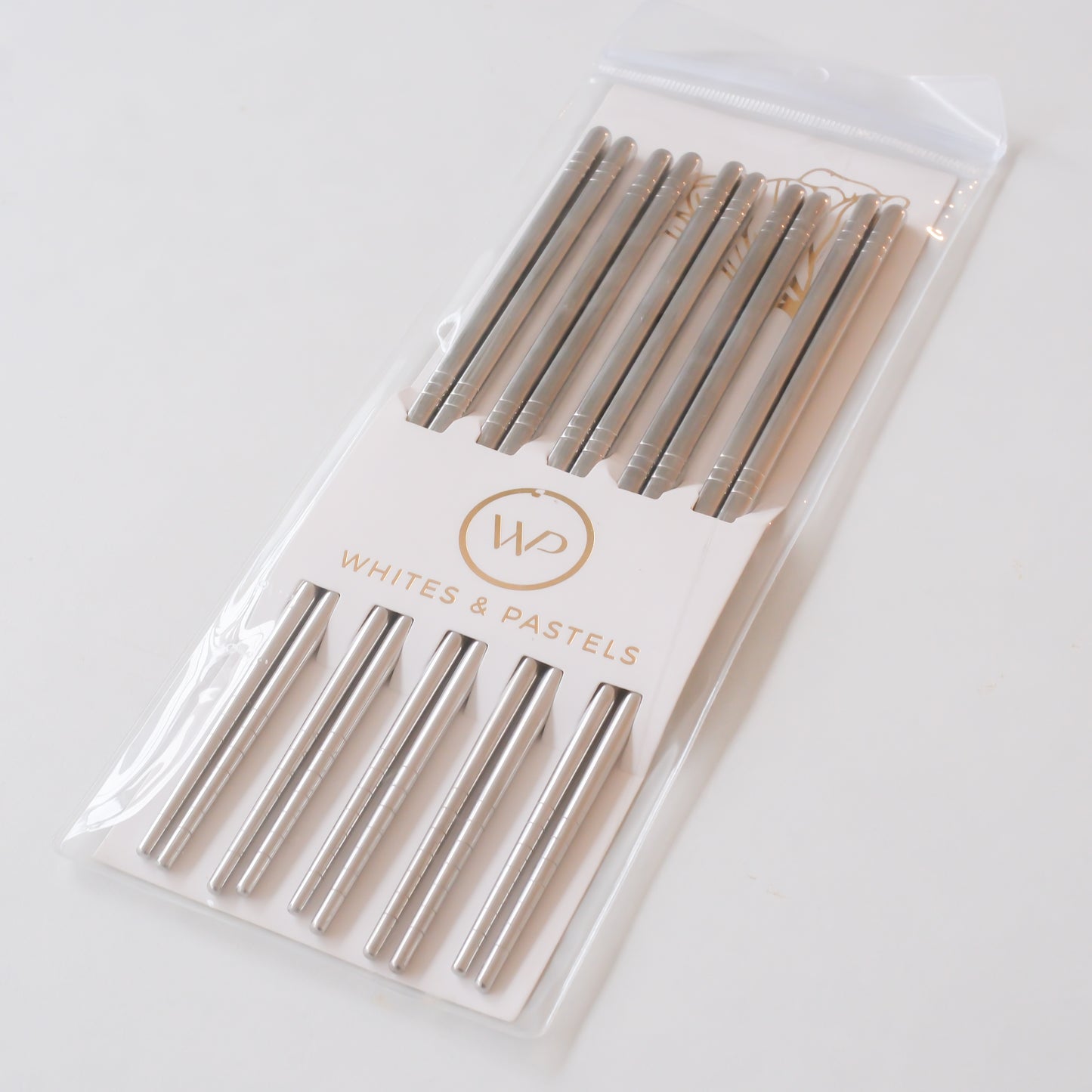 Packaged set of metal chopsticks. It is a 5 Pair Silver Chopstick set