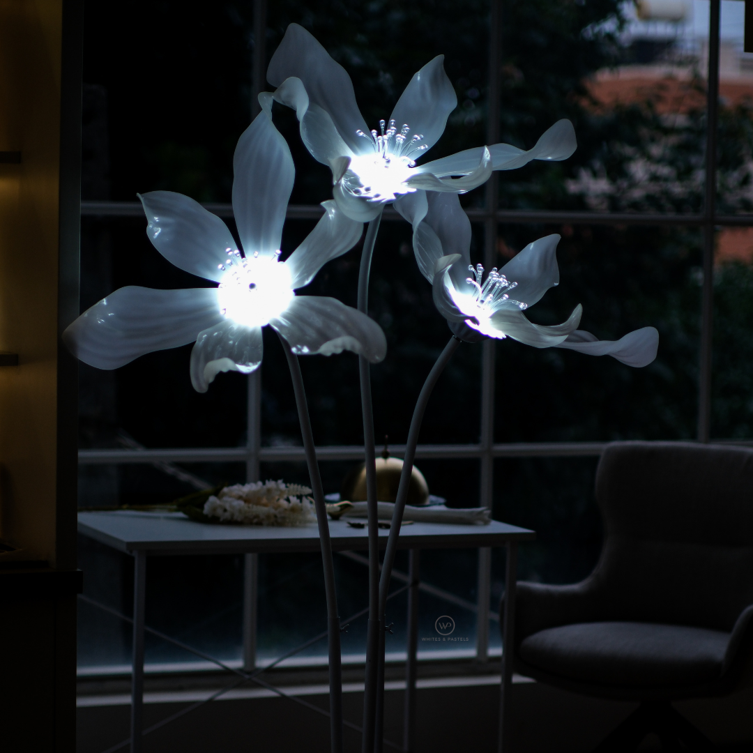 Elegant ambient floor lighting with floral design.