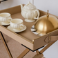 Premium beige butler tray styled with a ceramic tea set and serving cloche for elegant home serving.