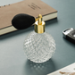 Elegant glass atomizer bottle for food presentation