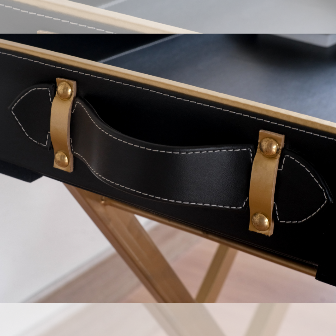 Black faux leather butler tray with foldable gold metal stand for serving breakfast, tea and coffee in style