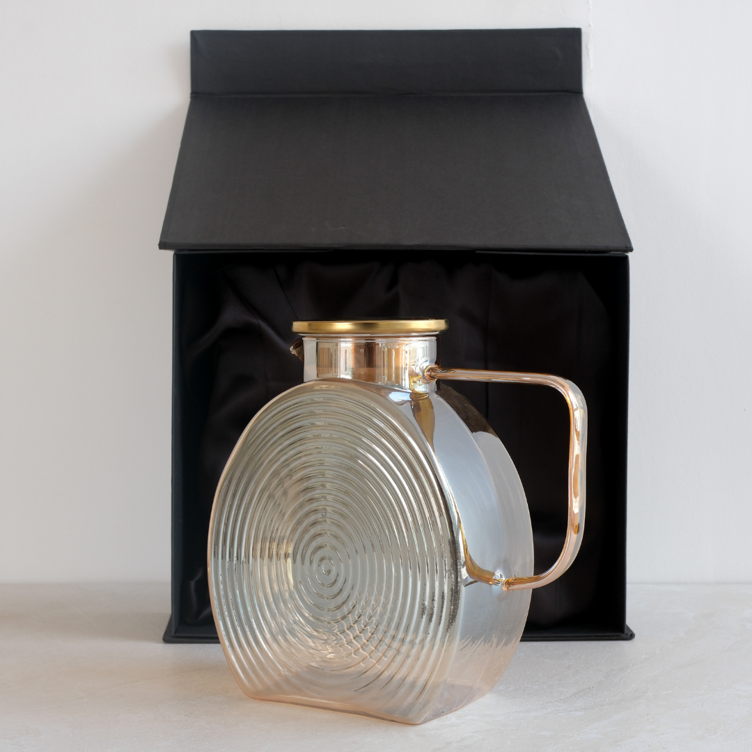 Brown glass serving jug with gold lid and sleek handle for stylish water and beverage serving in Black Gift Box