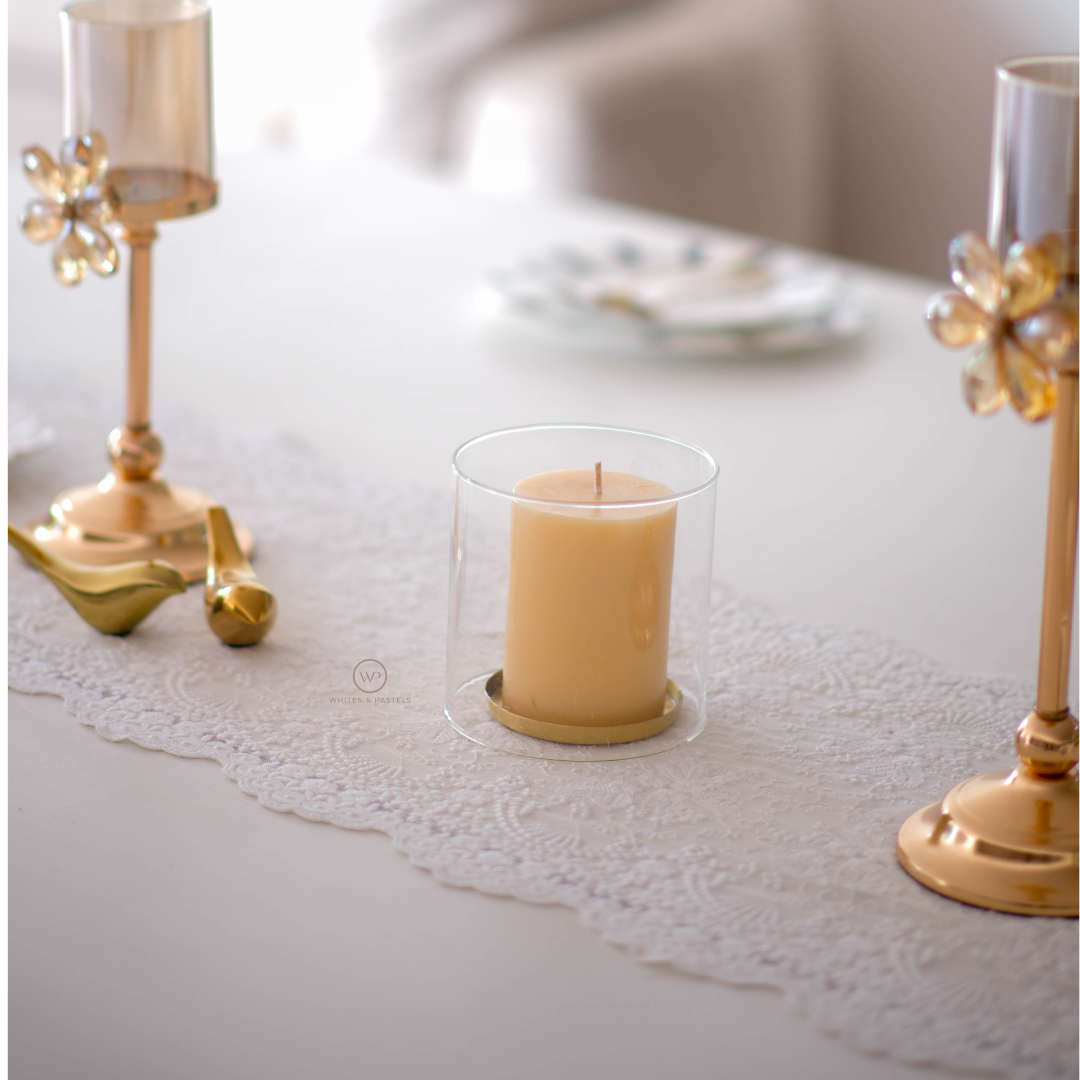 Elegant glass candle holder with gold metal base