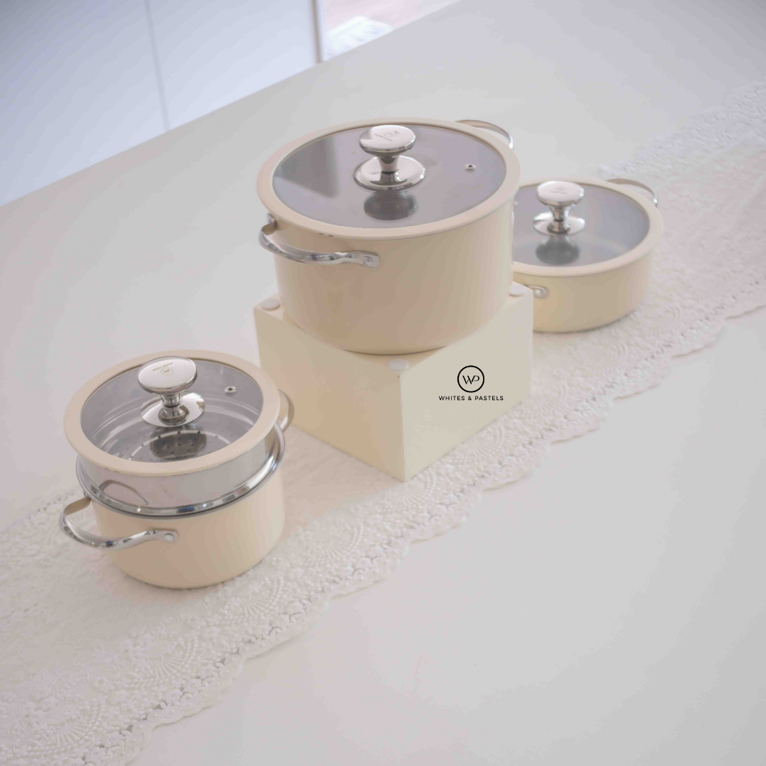 Ceramic coated pots and pans with stainless steel interior