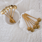 Elegant floral stainless steel stirrer in gold finish