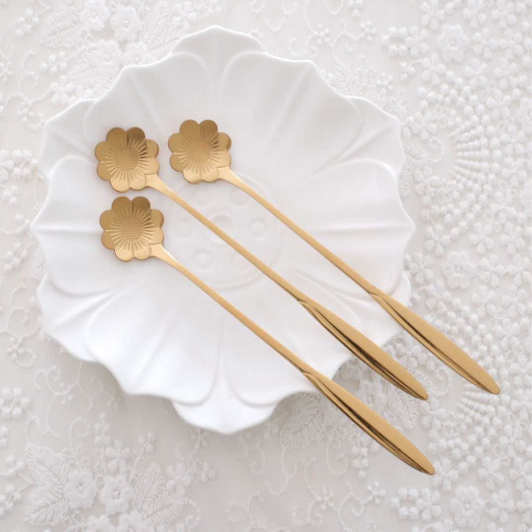 Gold plated floral stirrer for beverages