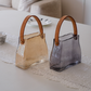 Luxury glass beverage jar with hammered texture and premium leather handle.