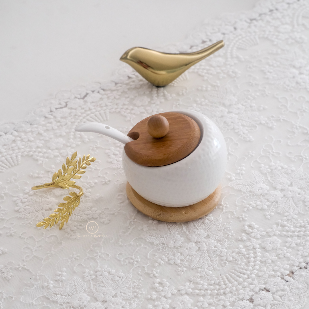Decorative condiment container for luxury dining spaces