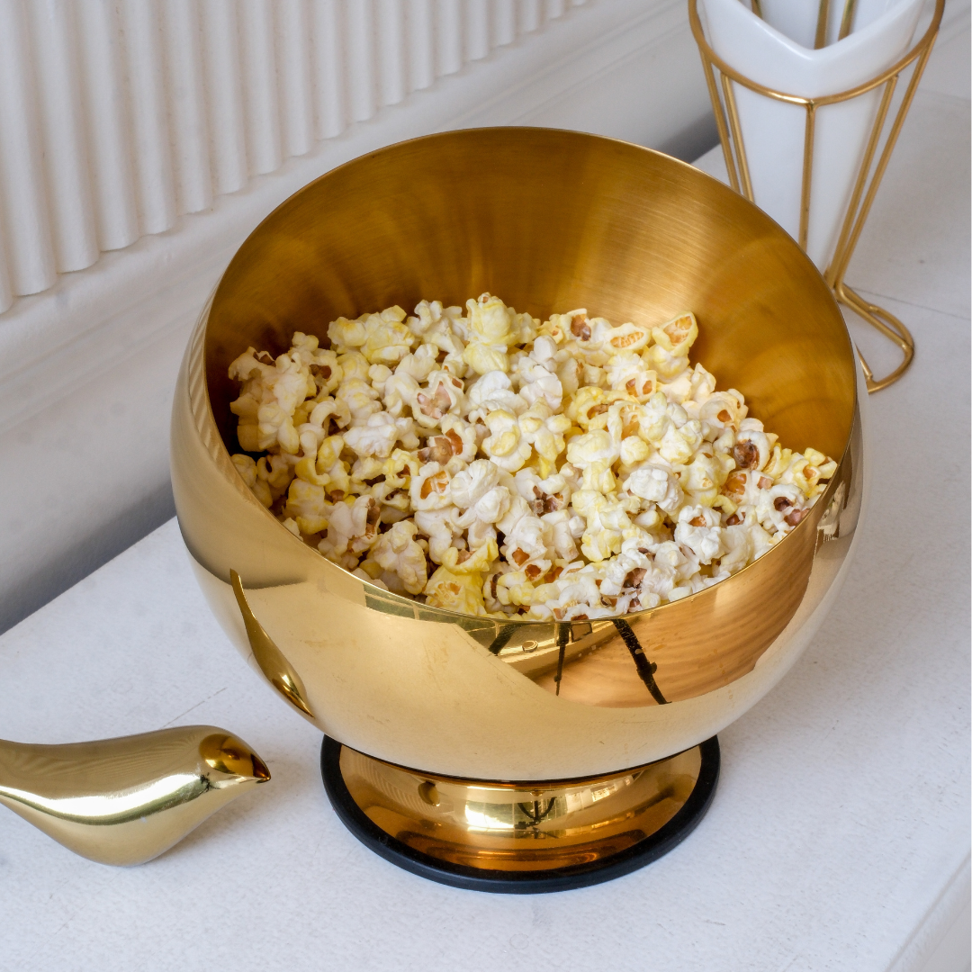 Luxury metallic gold serving bowl for snacks and entertaining in contemporary home décor.