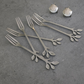 Modern stainless steel dessert fork with premium PVD silver finish