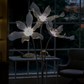 LED flower floor lamp with three colour lighting modes.