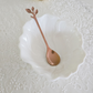 Modern leaf shaped tea spoon set in silver finish for luxury dining and contemporary table décor.