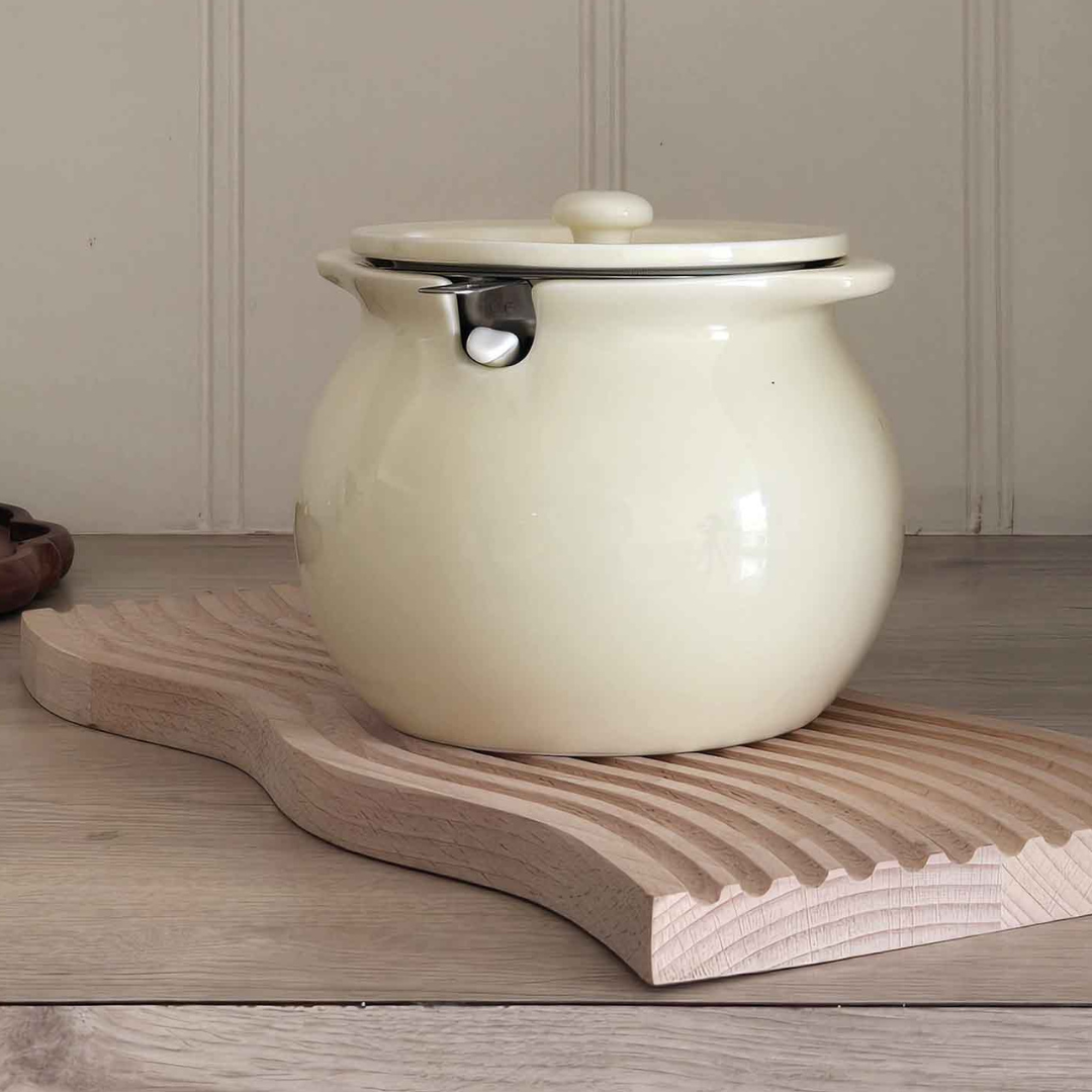 Elegant ceramic ghee storage container with pastel finish for modern kitchen décor.