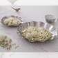 Hammered stainless steel decorative bowl arranged with white lotus flowers and fresh blooms, ideal as a festive centerpiece or floating flower bowl for home décor.