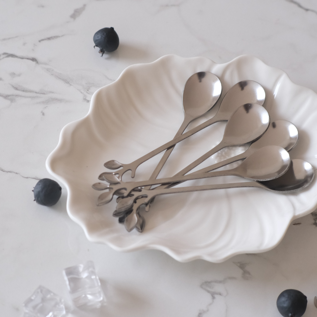 Designer leaf handle stainless steel spoon set for desserts, appetizers, espresso and gifting.