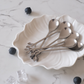 Designer leaf handle stainless steel spoon set for desserts, appetizers, espresso and gifting.