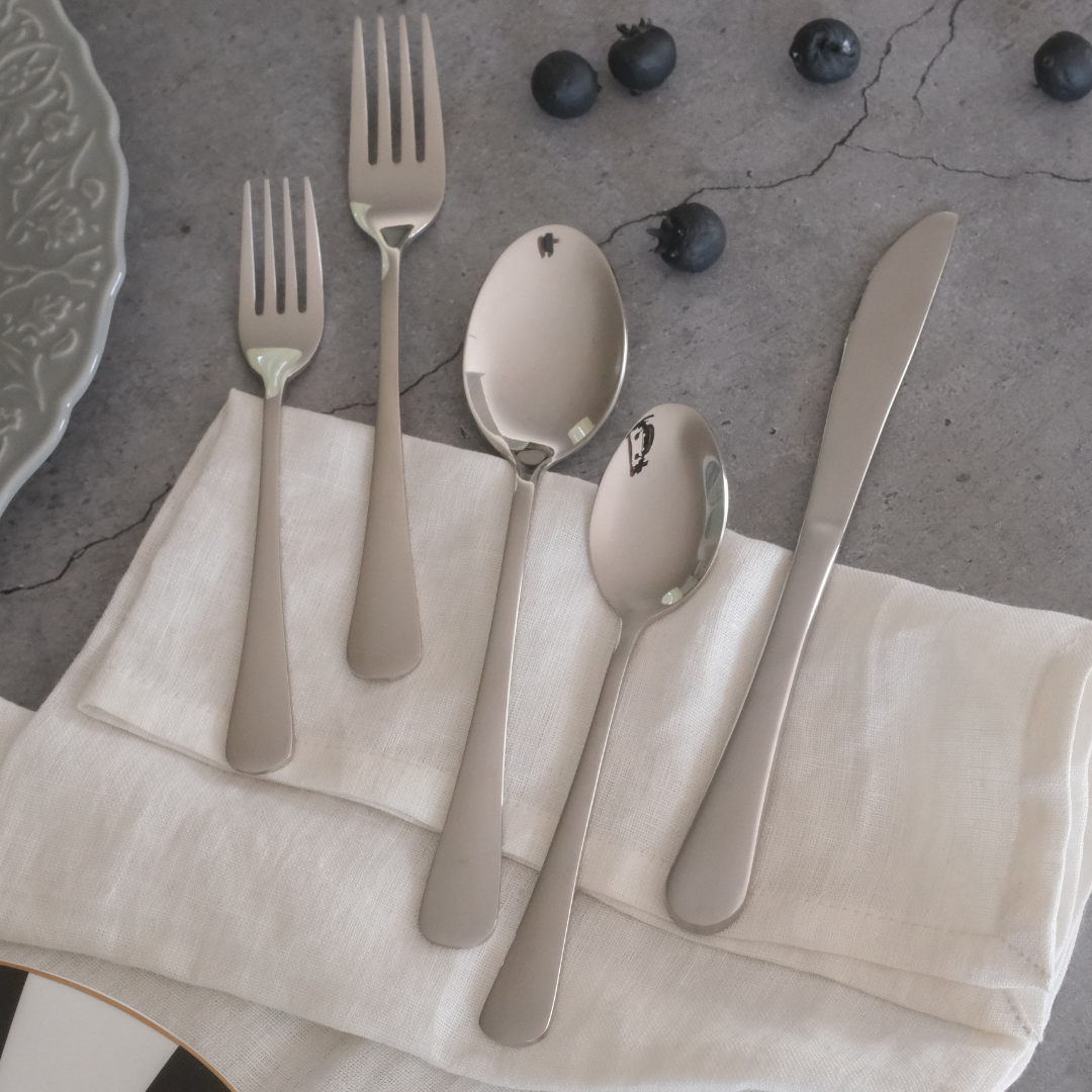Everyday dining spoon, fork and knife set with a polished finish for comfortable daily use.