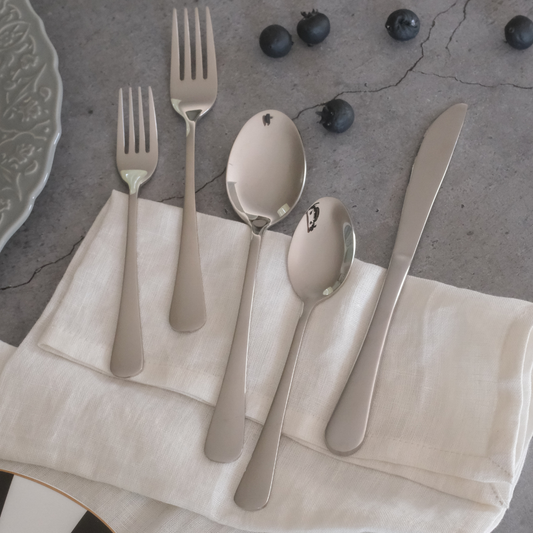 Everyday dining spoon, fork and knife set with a polished finish for comfortable daily use.