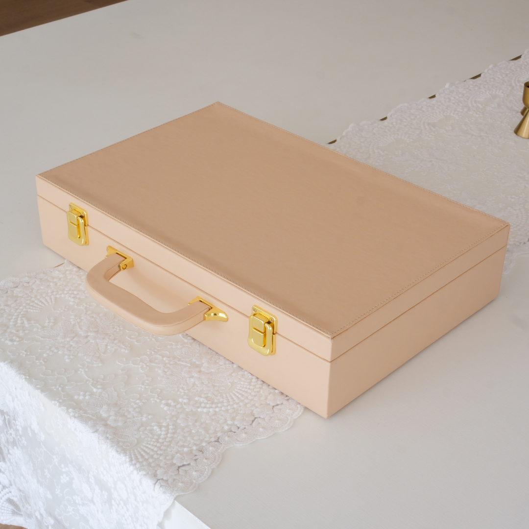  Luxury cutlery suitcase with classic cutlery on a dining table