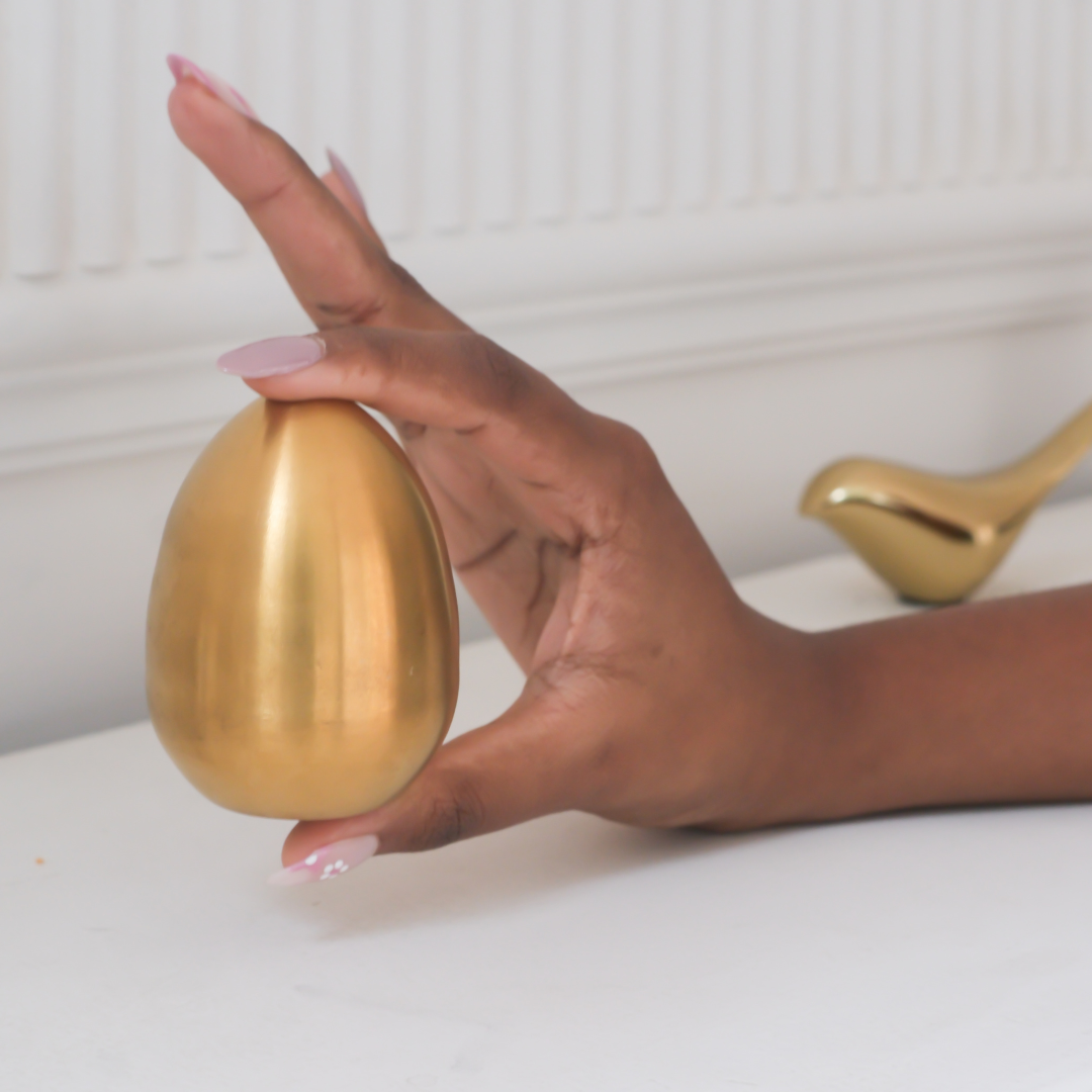 Decorative metallic salt and pepper dispensers for elegant table settings.