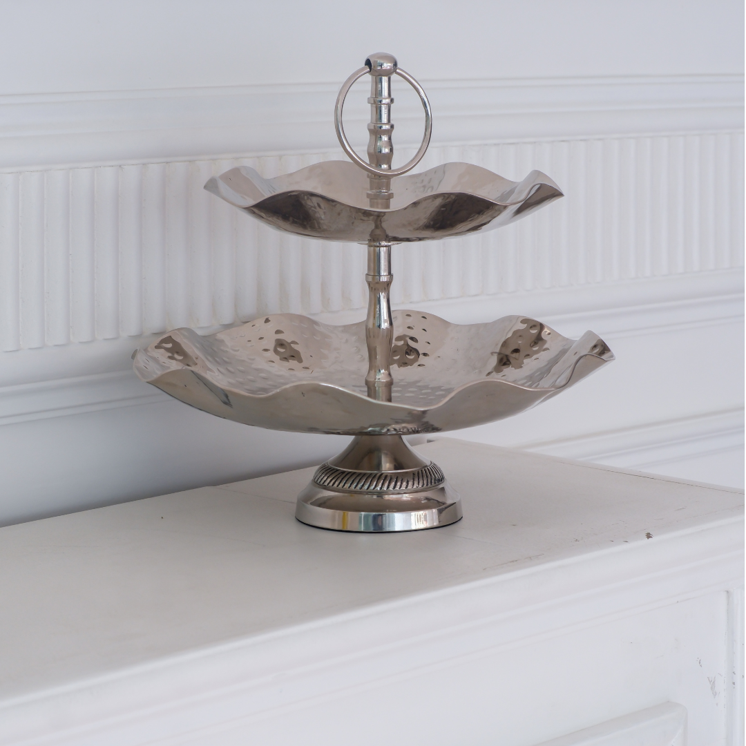 Designer metallic serving stand for entertaining guests and stylish food presentation.