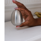 Luxury tabletop seasoning shakers with minimalist contemporary design.