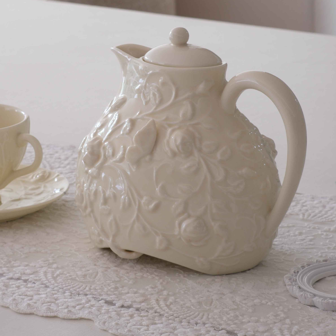 Premium ceramic teapot with embossed floral and butterfly detailing