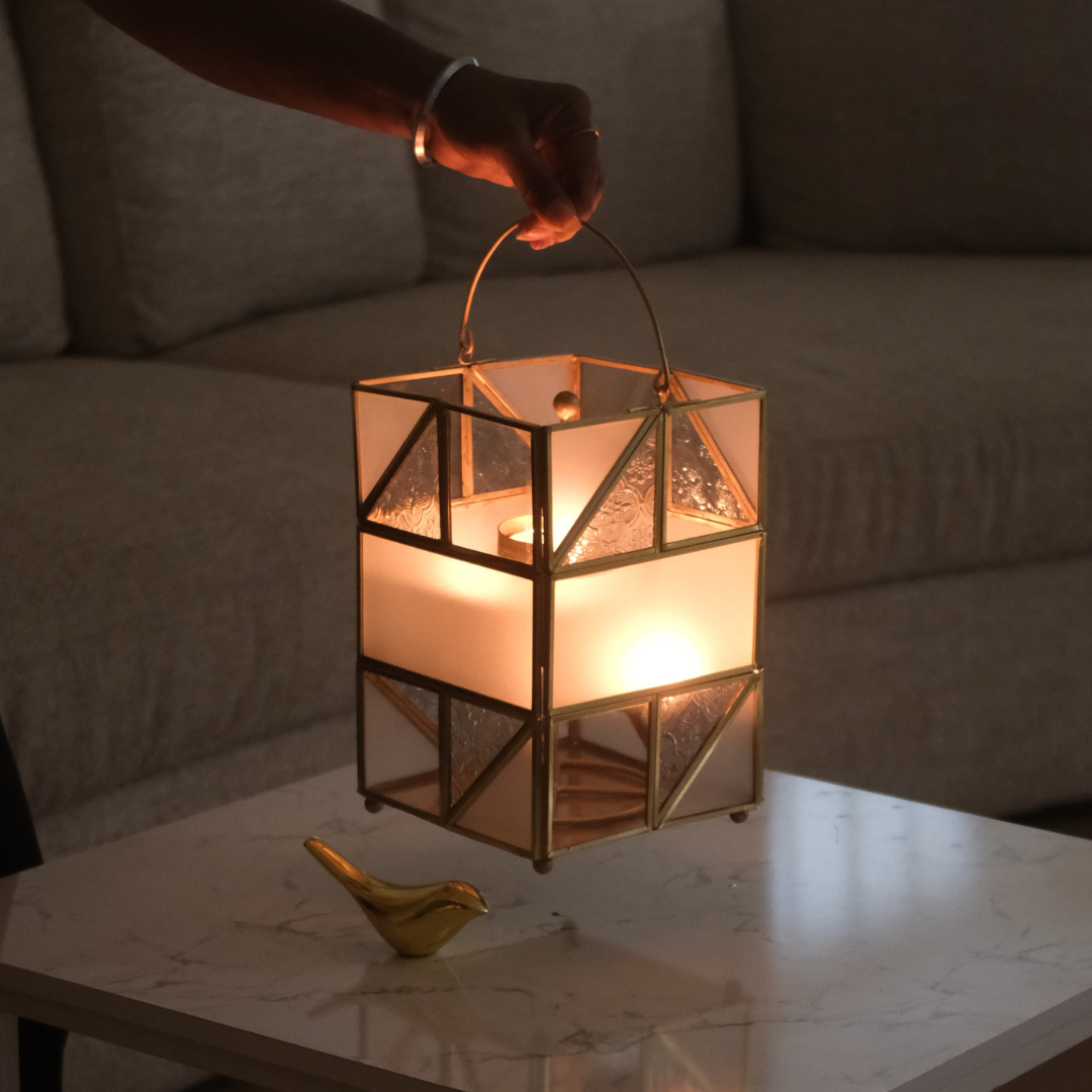Elegant gold candle lantern perfect for festive, wedding and home décor.