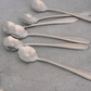 Premium silver daisy spoon set available in sets of 6 and 12 for luxury dining