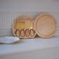 Elegant mango wood serving board for cheese, charcuterie, crackers, and appetizers.