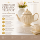 Premium embossed ivory tea pot with matching lid designed for sophisticated tea serving and entertaining.