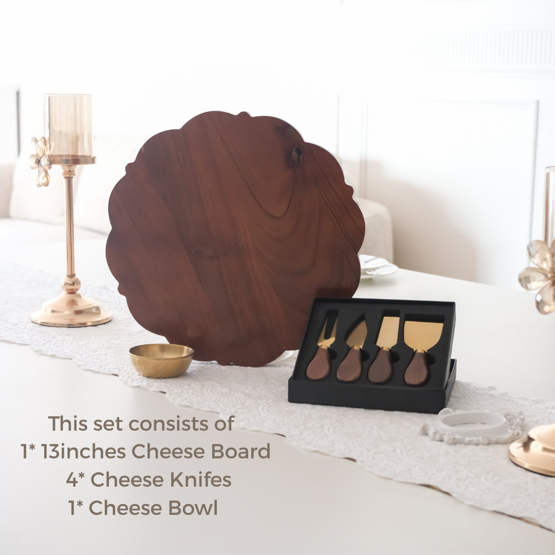 Cheese board placed on dining table with cheese knifes and serving bowl