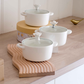 White ceramic serving pot perfect for curries, dal and biryani