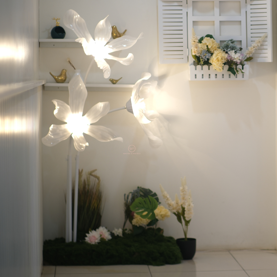 Elegant ambient floor lighting with floral design.