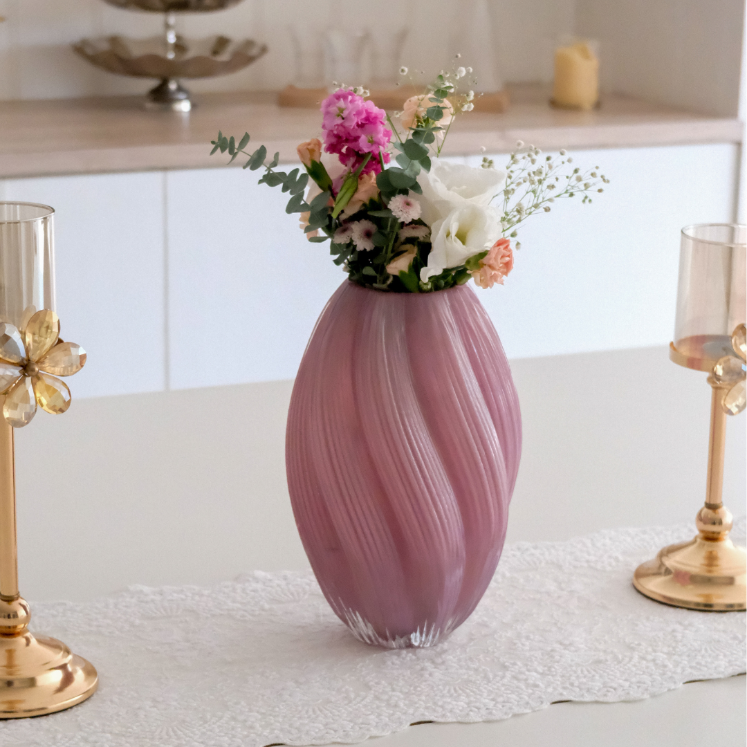 Elegant flower vase with fresh flowers on dining table