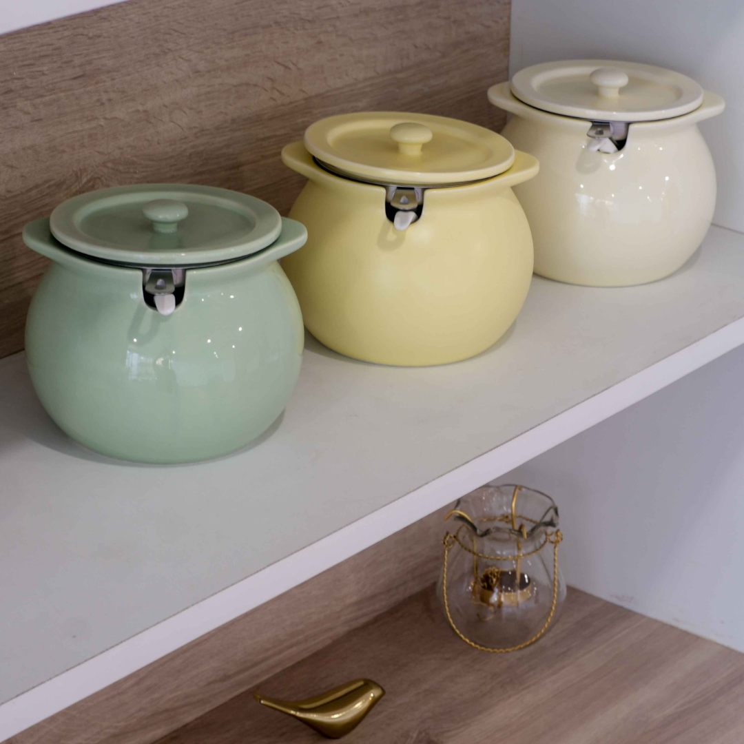 Premium ceramic kitchen ghee jar in 3 colors. Green, Yellow and Ivory.