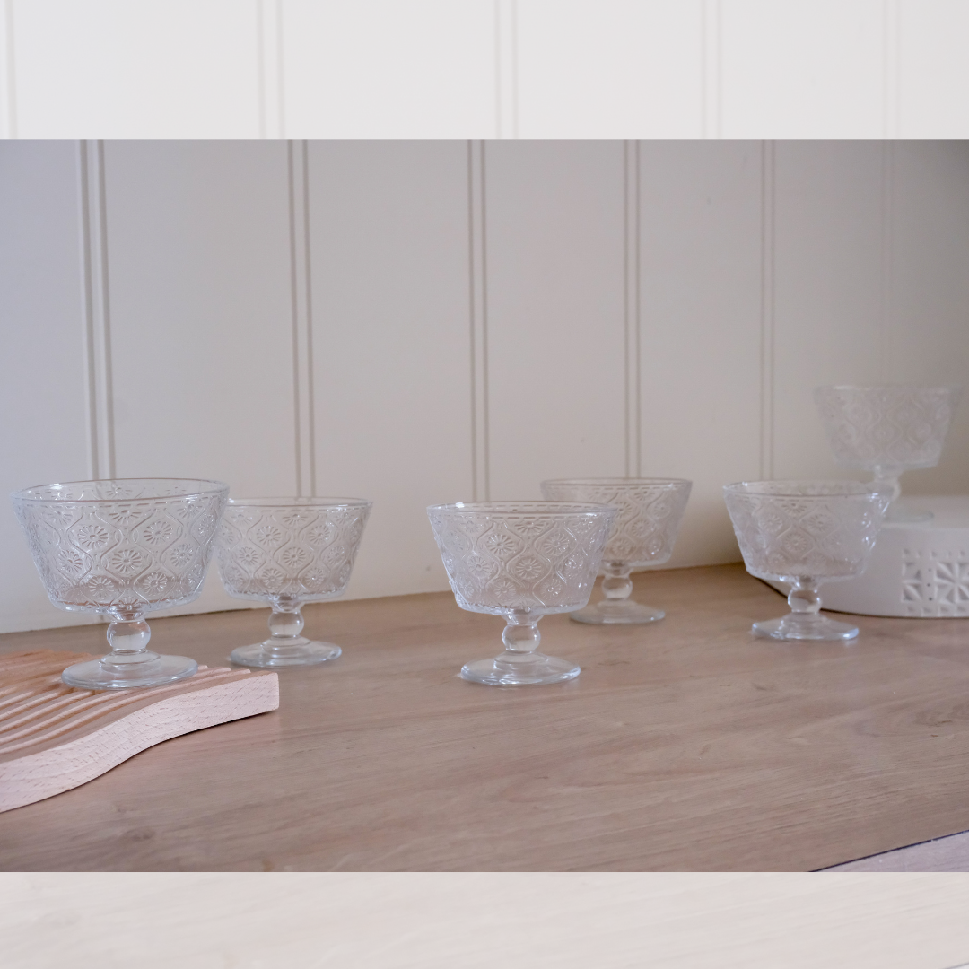 Thick glass ice cream cups featuring a decorative beaded pattern