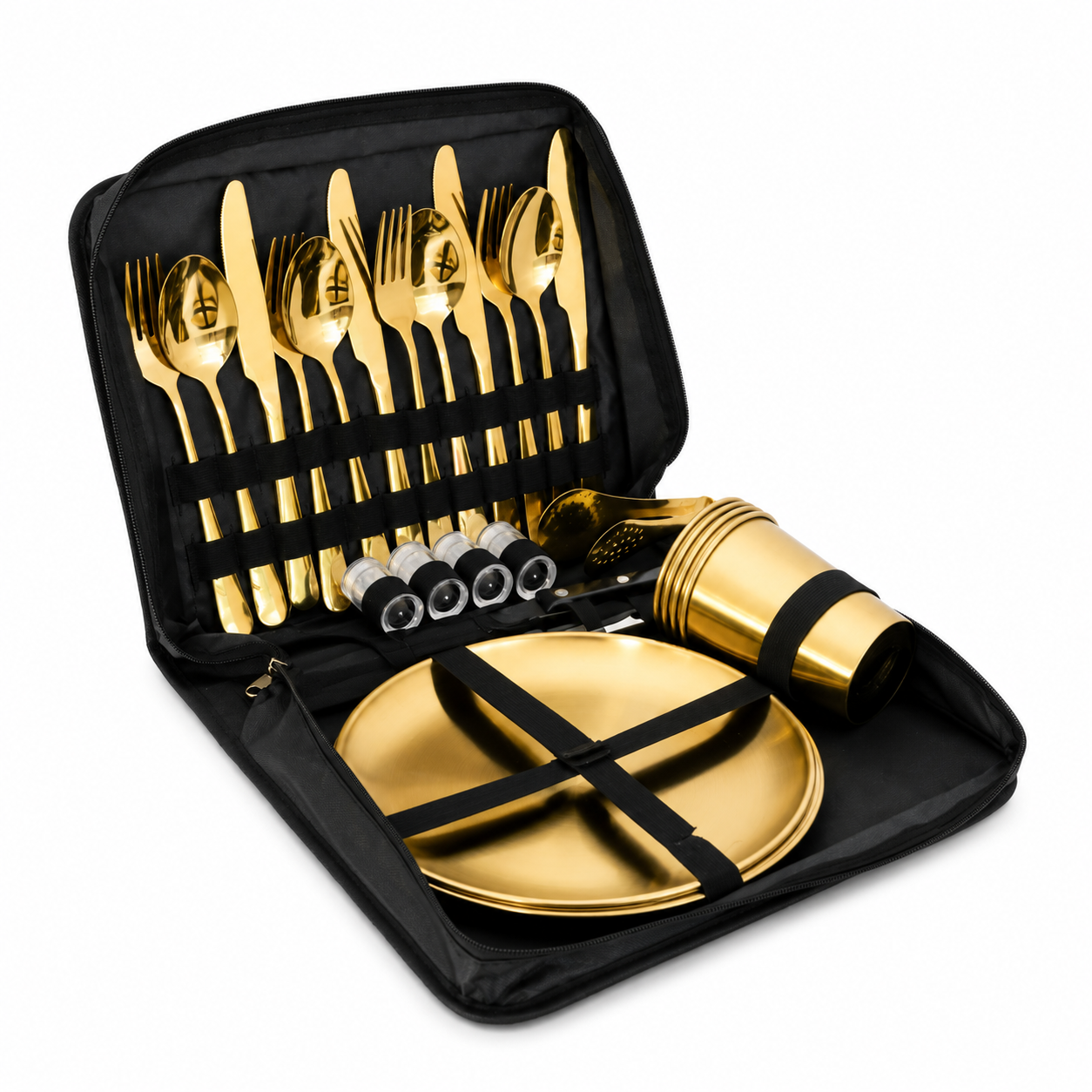 Gold cutlery set with plates and cups in a black carrying case on a white background