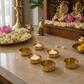 Premium gold candle holders ideal for pooja room decoration and festive occasions