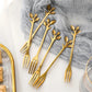 Set of 6 gold leaf shaped stainless steel fruit forks with premium mirror finish