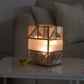 Gold metal and glass votive holder for tea lights and decorative candles.