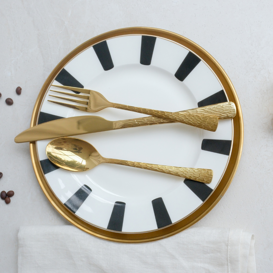 Gold PVD-coated SS304 stainless steel flatware set with premium textured handles for modern table styling.
